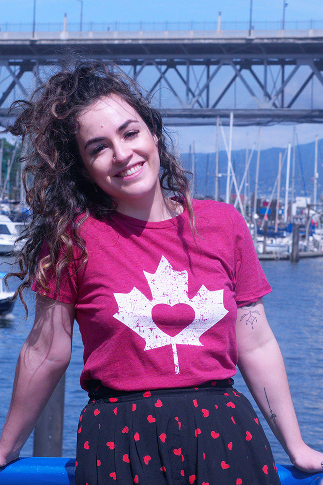 Canadian maple leaf on a red heart - i love canada Canadian maple leaf on a red heart - i love canada